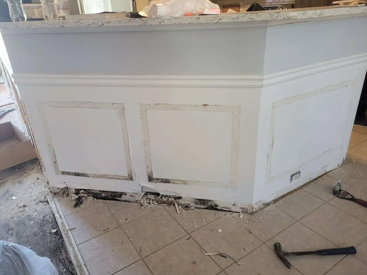 Water damage and mold on kitchen during Sewage Cleanup & Sanitation in Old Saybrook